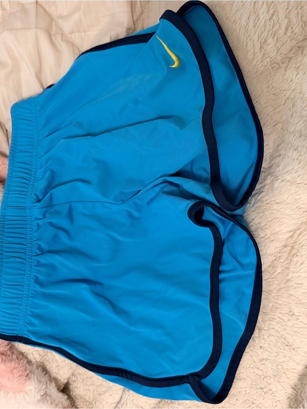 Nike Turquoise Running Shorts with Navy Trim and Yellow Swoosh